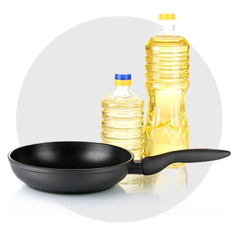 A frying pan and olive oil for food